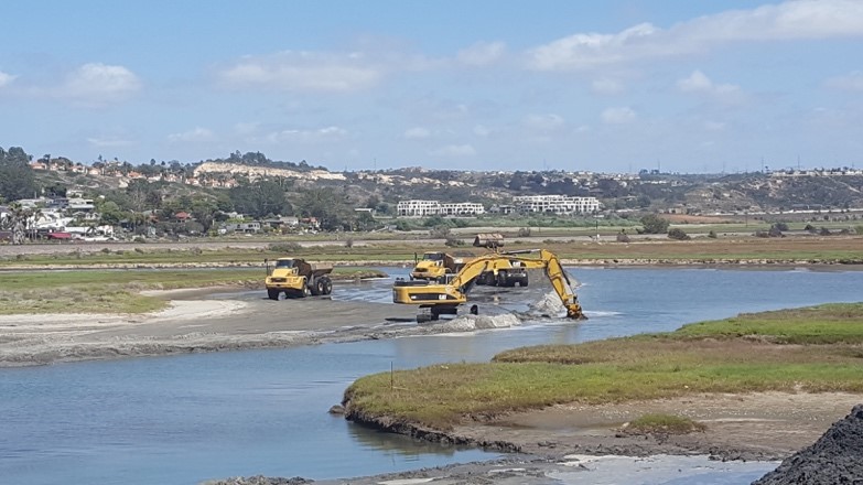 Excavating and loading of sand and cobbles within the main northern channel at Los Peñasquitos Lagoon on 5/23/16 at 2:43 pm.  Photo by M. Hastings.